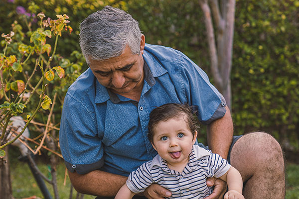 elderly man with baby