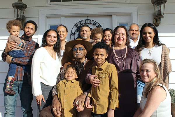 large latino family gathered together